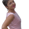 Photo of Sister Dorothy, in pink dress, standing